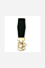Load image into Gallery viewer, Luxury Faux Leather Keychain – Timeless Elegance in Every Detail