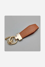 Load image into Gallery viewer, Luxury Faux Leather Keychain – Timeless Elegance in Every Detail